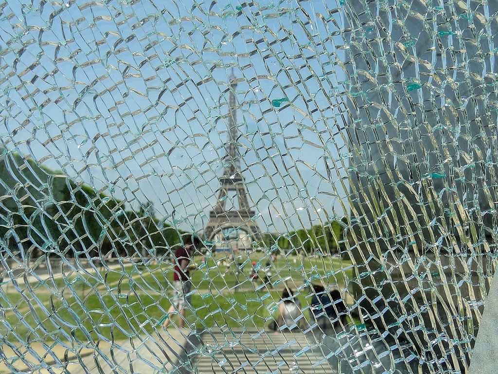 Eiffel Tower through shattered glass